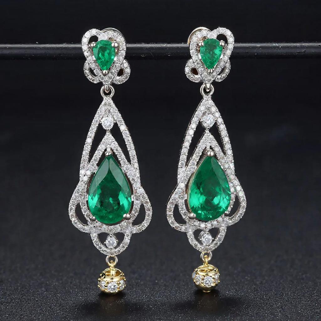 Серьги с изумрудами